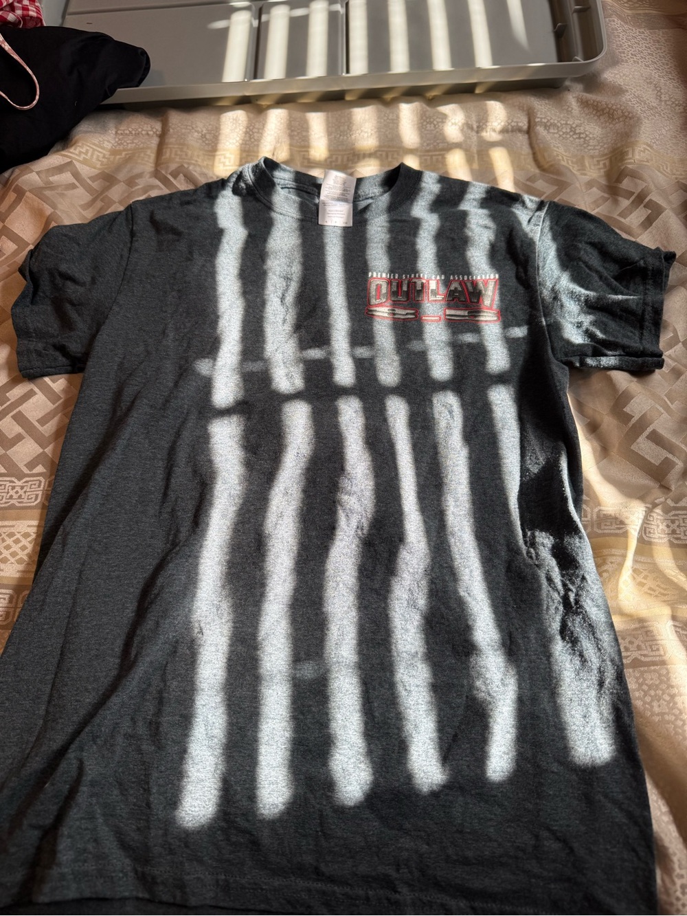 Outlaw Graphic T-Shirt in Black and Red